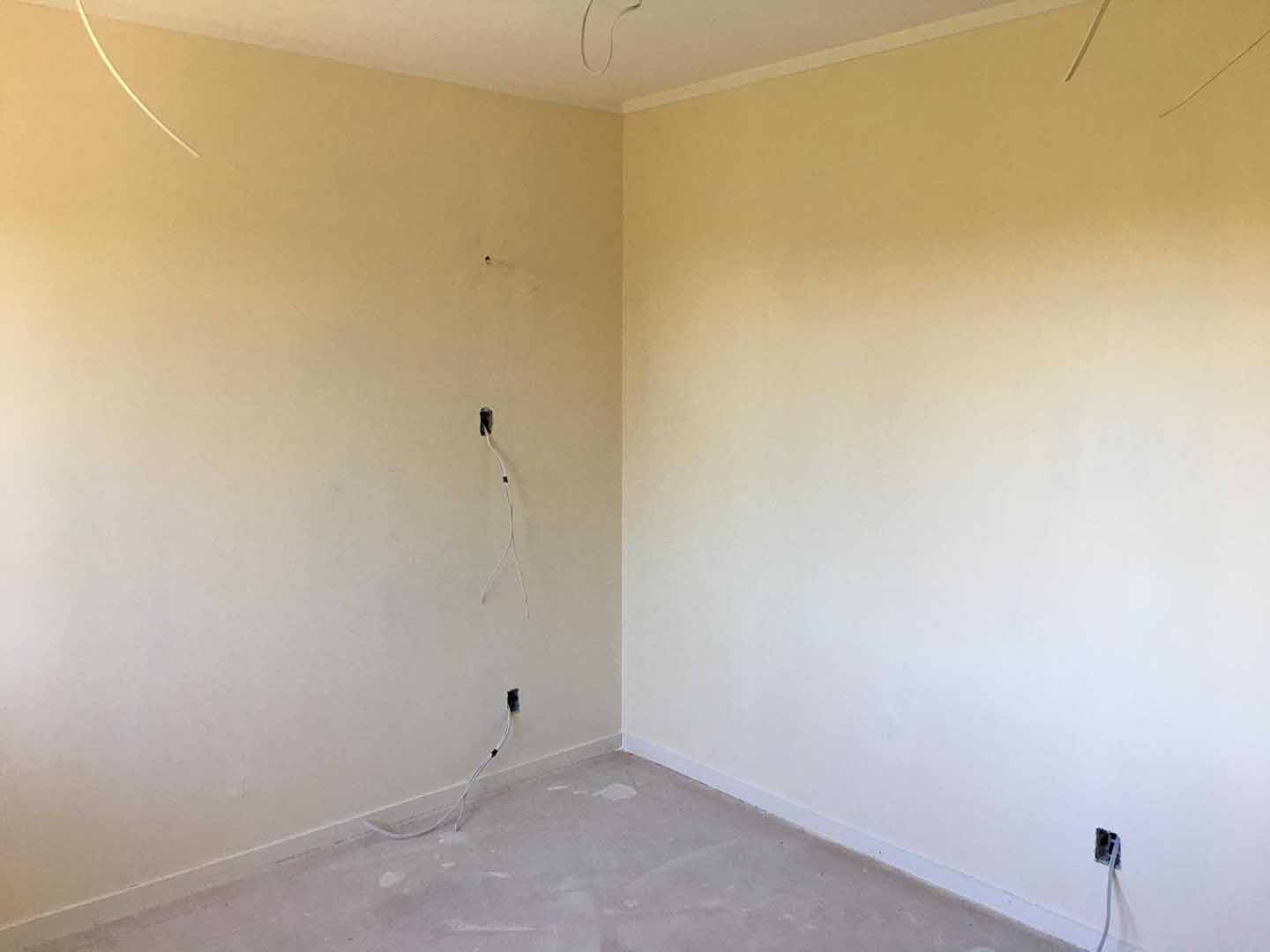 Plasterboard wall repair and re-stopping in Auckland showing smooth finished surface ready for painting